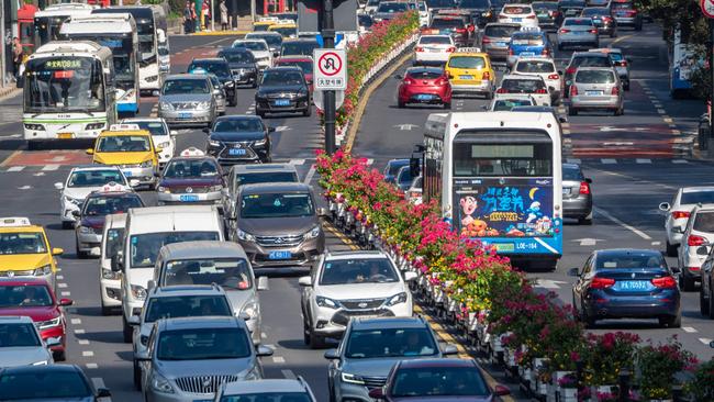 Cars crowd a road during morning rush hour on the first working day after a week-long ‘golden week’ holiday in Shanghai last Friday. Picture: AFP