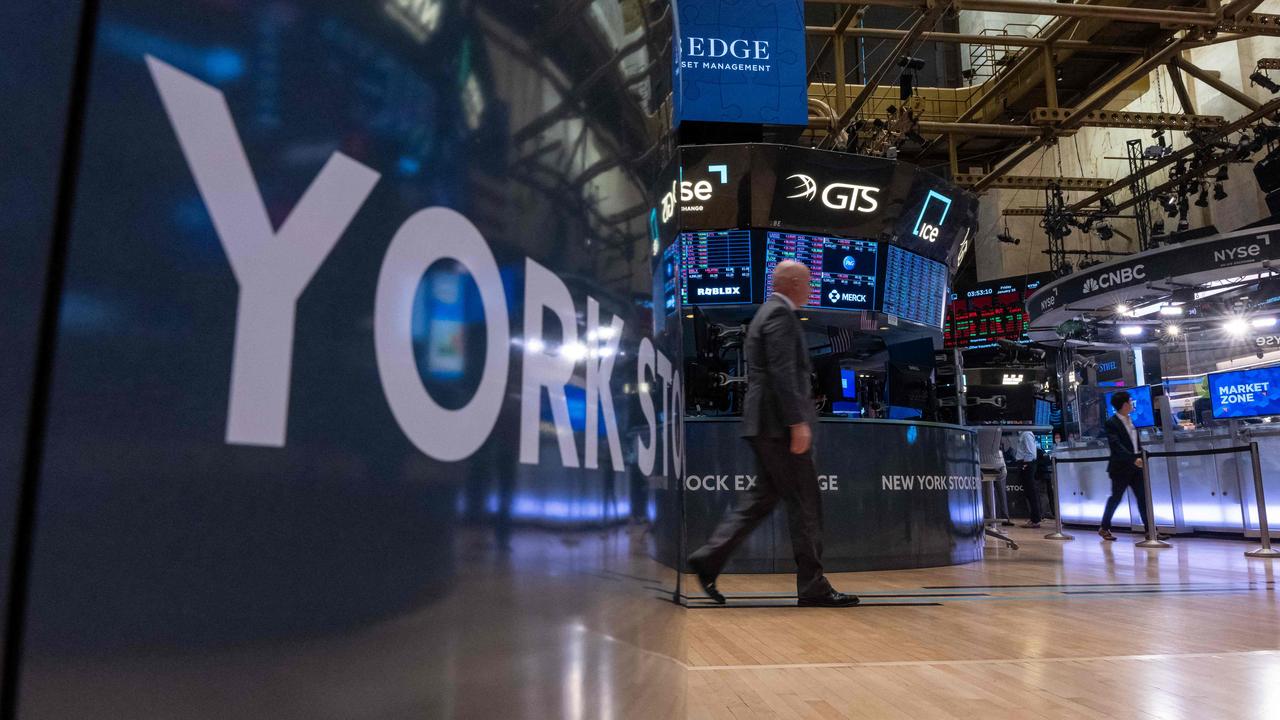 Traders on the floor of the New York Stock Exchange on Friday. Picture: AFP