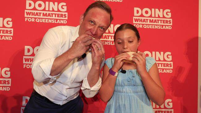 Queensland Premier Steven Miles at the Labor launch on Sunday with his daughter Bridie. Picture: Adam Head