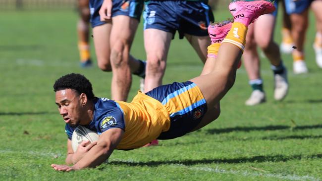 Sydney Gold fullback CJ Udeh dives in for a great solo try at the trials. Picture: Steve Montgomery