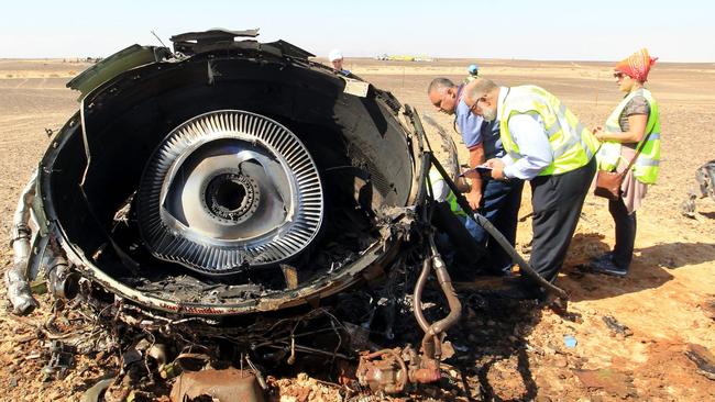 Egyptian investigators check debris from the Metrojet plane brought down over Egypt in 2015.