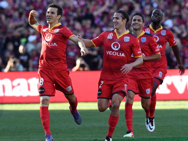 Isaias celebrates his goal for Adelaide United in the A-League grand final.