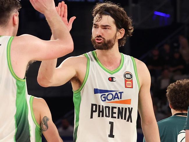 MELBOURNE, AUSTRALIA - OCTOBER 20: Jordan Hunter of the Phoenix celebrates at the buzzer during the round five NBL match between Melbourne United and South East Melbourne Phoenix at John Cain Arena, on October 20, 2024, in Melbourne, Australia. (Photo by Kelly Defina/Getty Images)