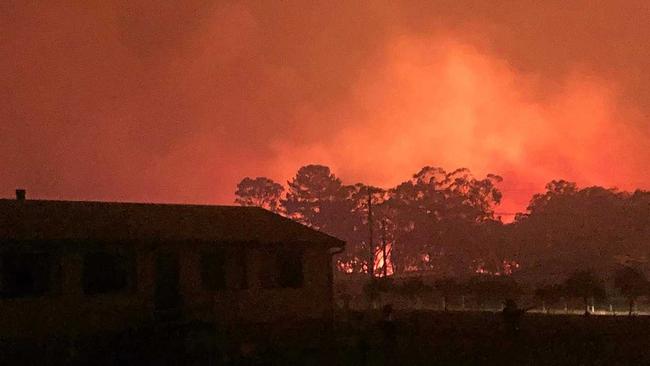 Samantha Wantling captures a photo of a raging fire at Stanthorpe. . Picture: Samantha Wantling