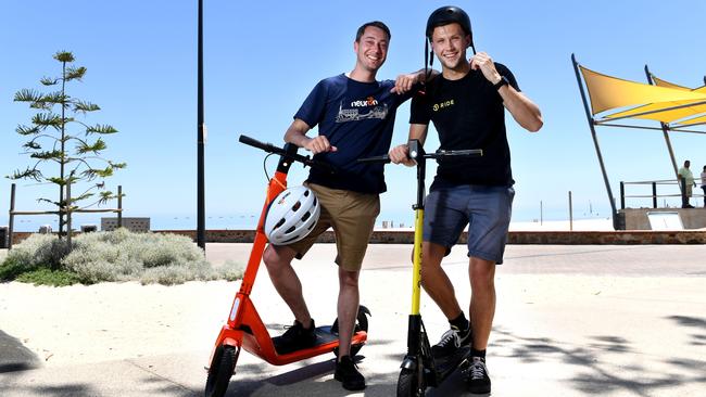 Neuron City Manager Jayden Bryant and Operations Manager RIDE Toby Pym at Glenelg Beach. Picture: Tricia Watkinson