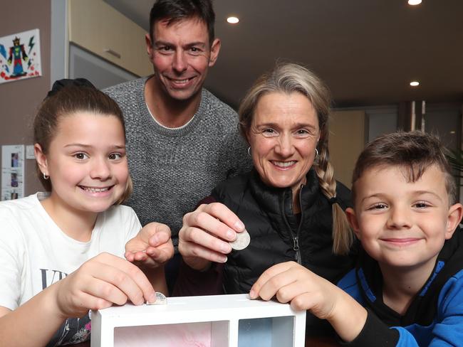 Tamara and Scott Riddell and their children Heidi, 10 and Nate, 7 are looking at better ways to manage their personal finances.  Picture: Alex Coppel.