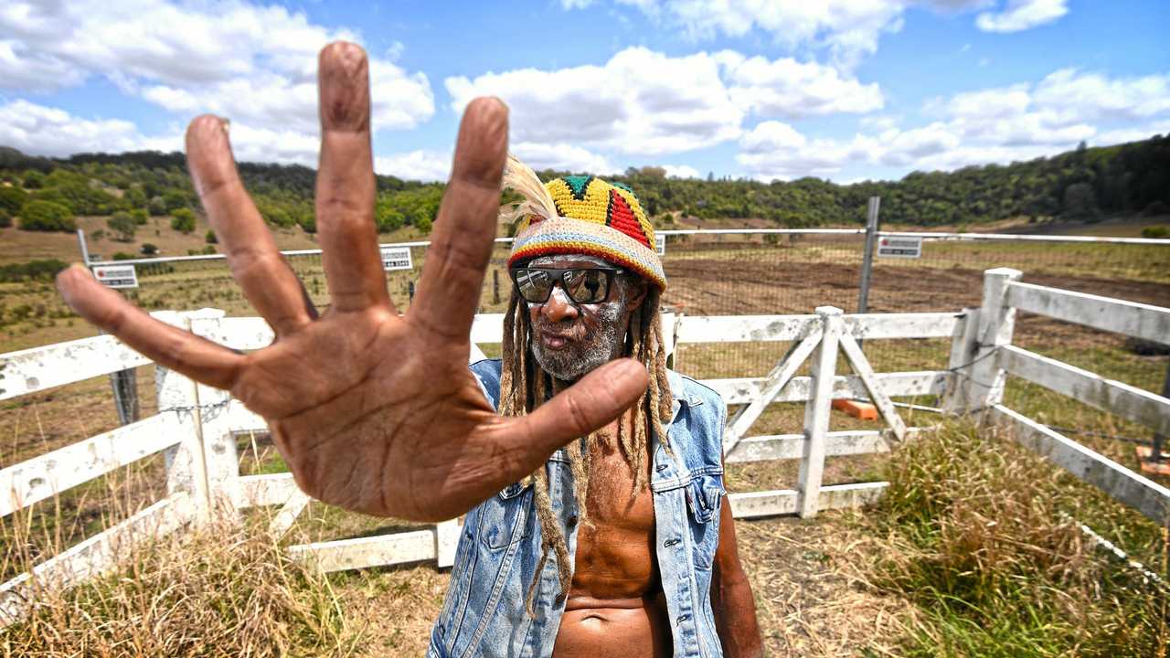 Robert Corowa protests at the site of the North Lismore Plateau development. Picture: Marc Stapelberg