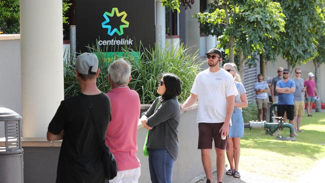 Newly unemployed queue up outside Southport Centrelink. Picture: Glenn Hampson