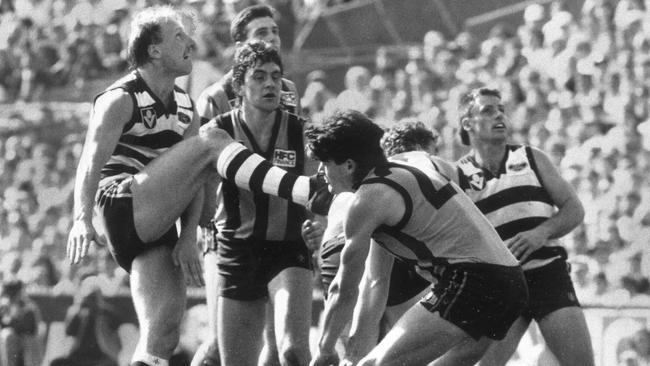 Gary Ablett plucks the ball from a ruck contest to kick a miraculous goal.