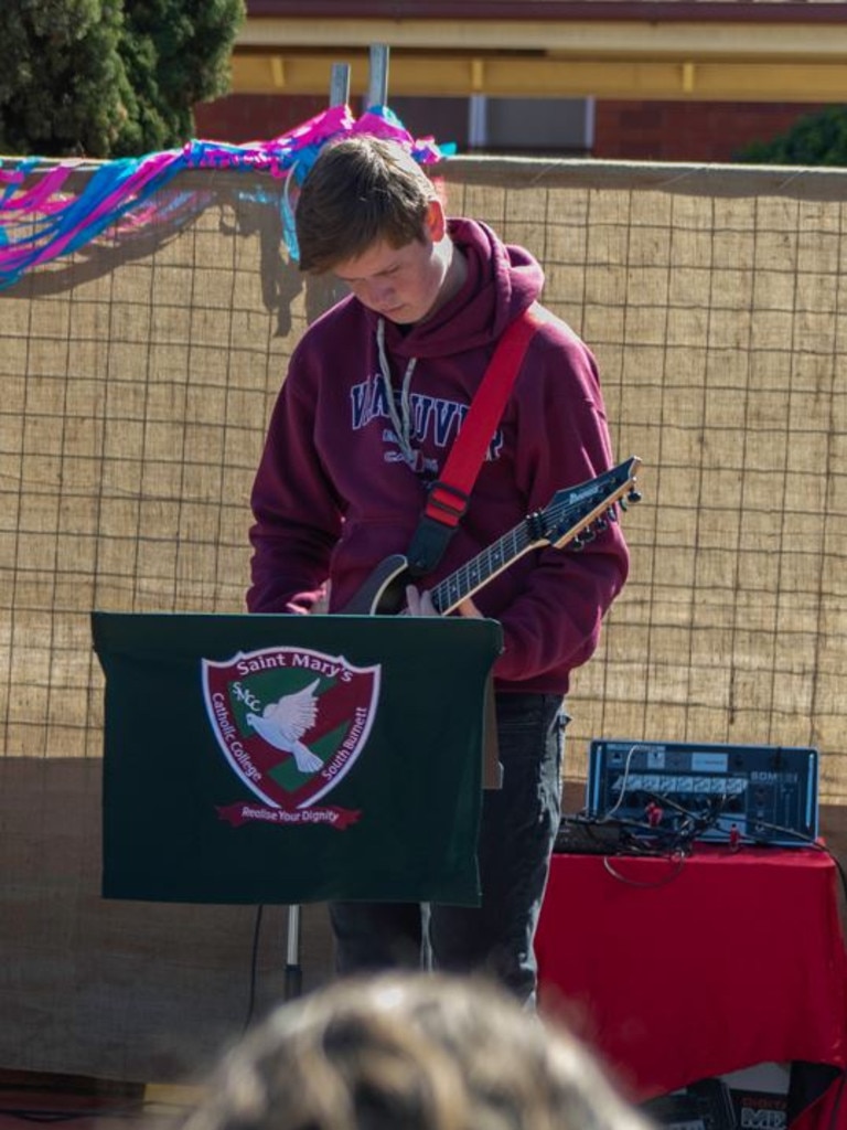 A St Mary’s Catholic College music student at the Kingaroy BaconFest 2023.