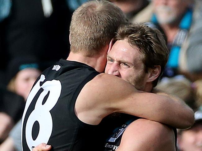 20-7-14 - AFL Round 18 - Port Adelaide v Melbourne at AAMI Stadium - Jay Schulz celebrates a goal with Kane Cornes Picture Simon Cross