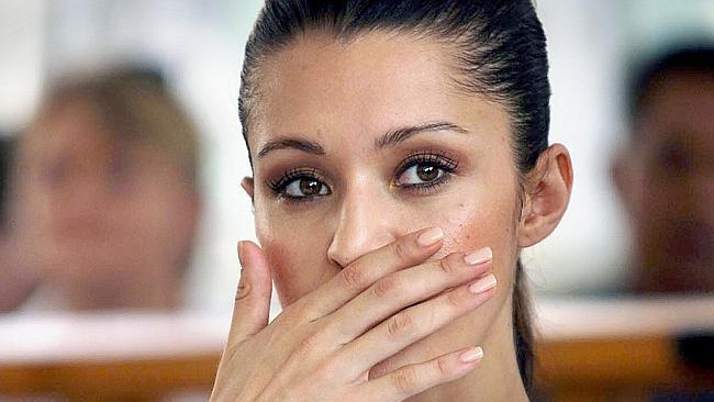 A shocked Michelle Leslie during one of her court appearances. Picture: AFP/HWT library