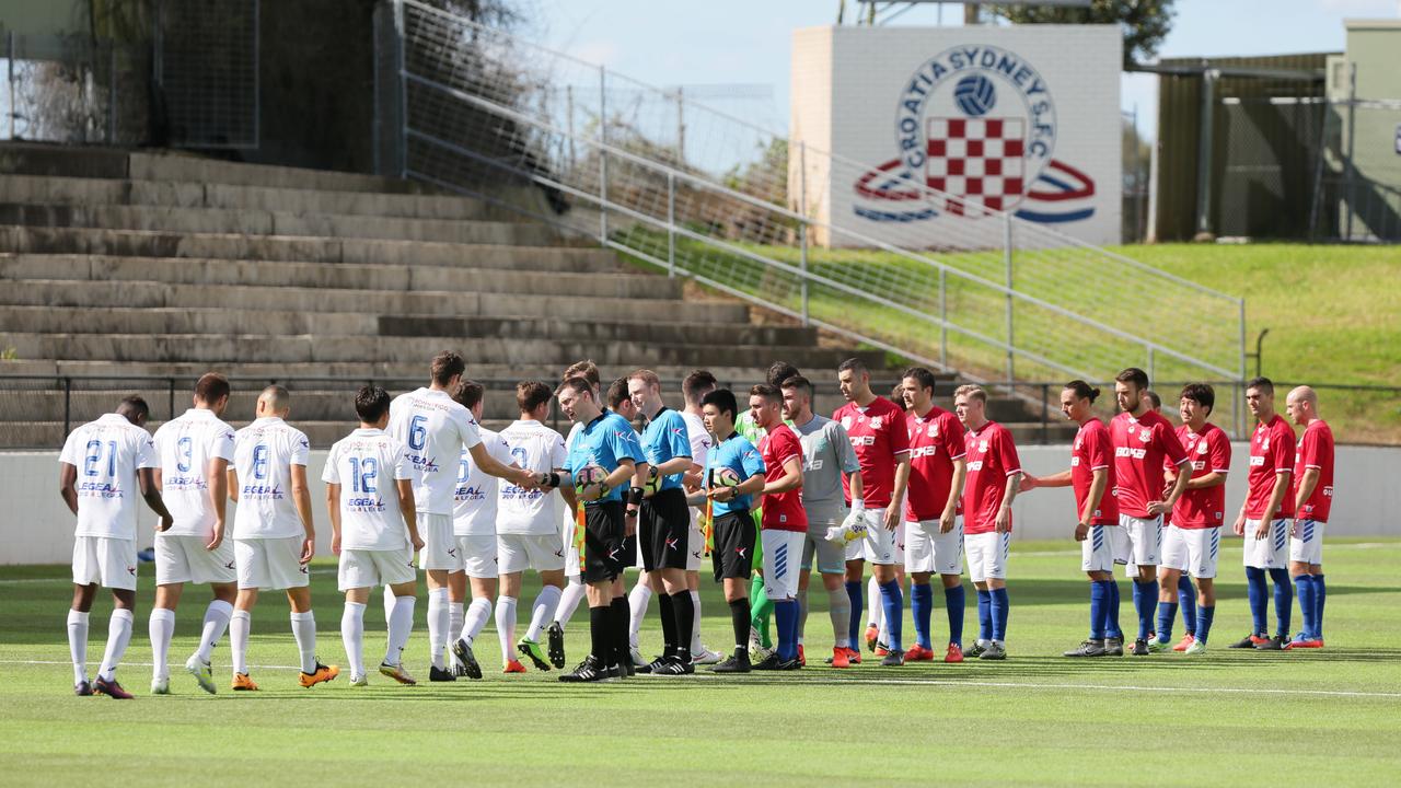 Sydney United 58 FC shake hands during a fixture against Bonnyrigg White Eagles. Pics Ian Svegovic