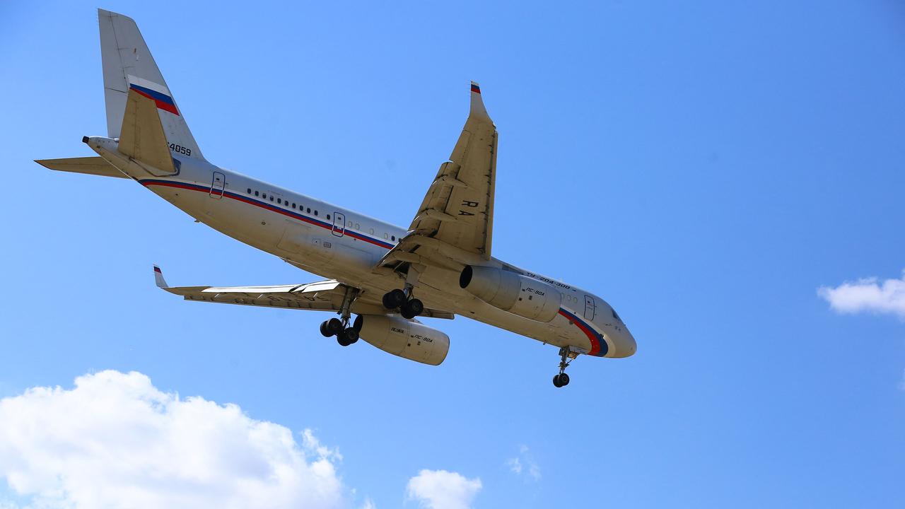 A Russian Tupolev Tu-204-300 aircraft prepares to land at Ankara Esenboga Airport in Ankara on August 1, 2024, as Turkish authorities announced that 26 prisoners have been exchanged with Russia and West. (Photo by CAGLAR / AFP)