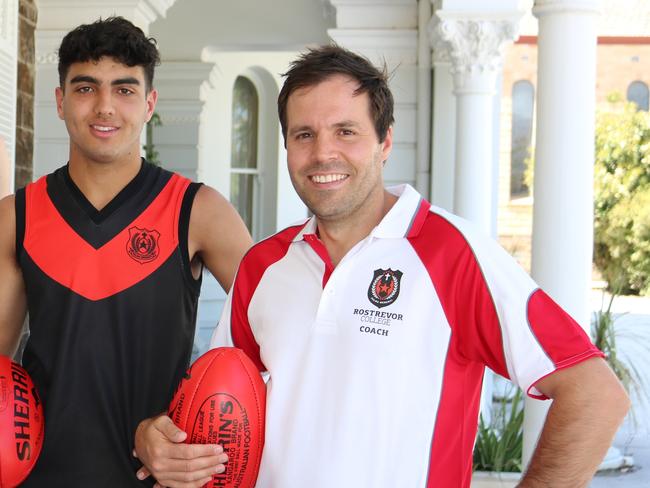 Triple Magarey Medallist James Allan is Rostrevor College's newfootball director and first XVIII coach. With players (from left) MatthewDnistriansky, Ned Carey and Xavier Tranfa. Picture: Rostrevor College