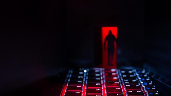 Internet criminal is watching you from darkness. Online shopping scams, fraud generic