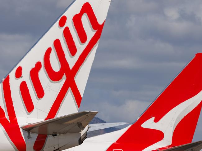 Townsville, Queensland - 28 July 2021: Virgin Australia and Qantas tails on display at Townsville Airport in far North Queensland27 October 2024Kendall HillPhoto - Getty Images