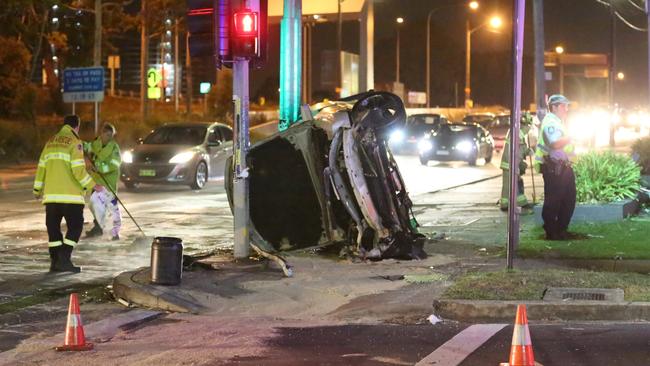 Police at the scene of the crash. Picture: Steve Tyson