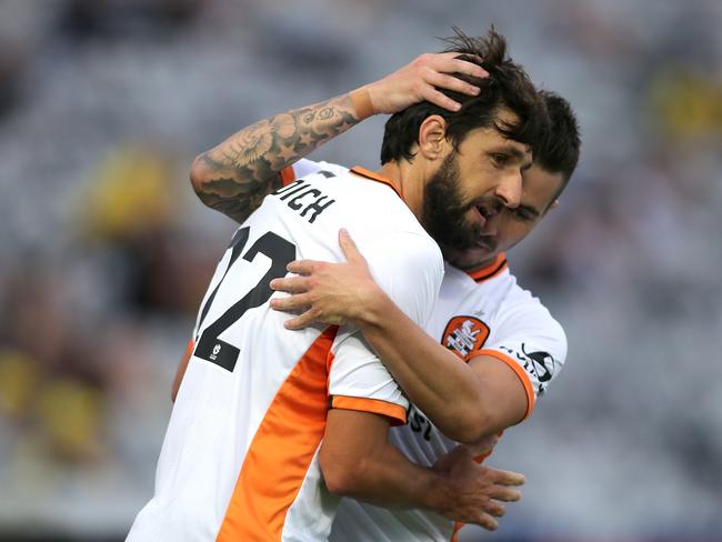 GOSFORD, AUSTRALIA - DECEMBER 18: Jamie Maclaren and Thomas Broich of the Roar celebrate a goal during the round 11 A-League match between the Central Coast Mariners and Brisbane Roar at Central Coast Stadium on December 18, 2016 in Gosford, Australia. (Photo by Tony Feder/Getty Images)