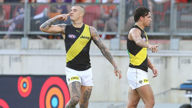 Dustin Martin directs a snorting sledge to a GWS player. Picture: Getty Images