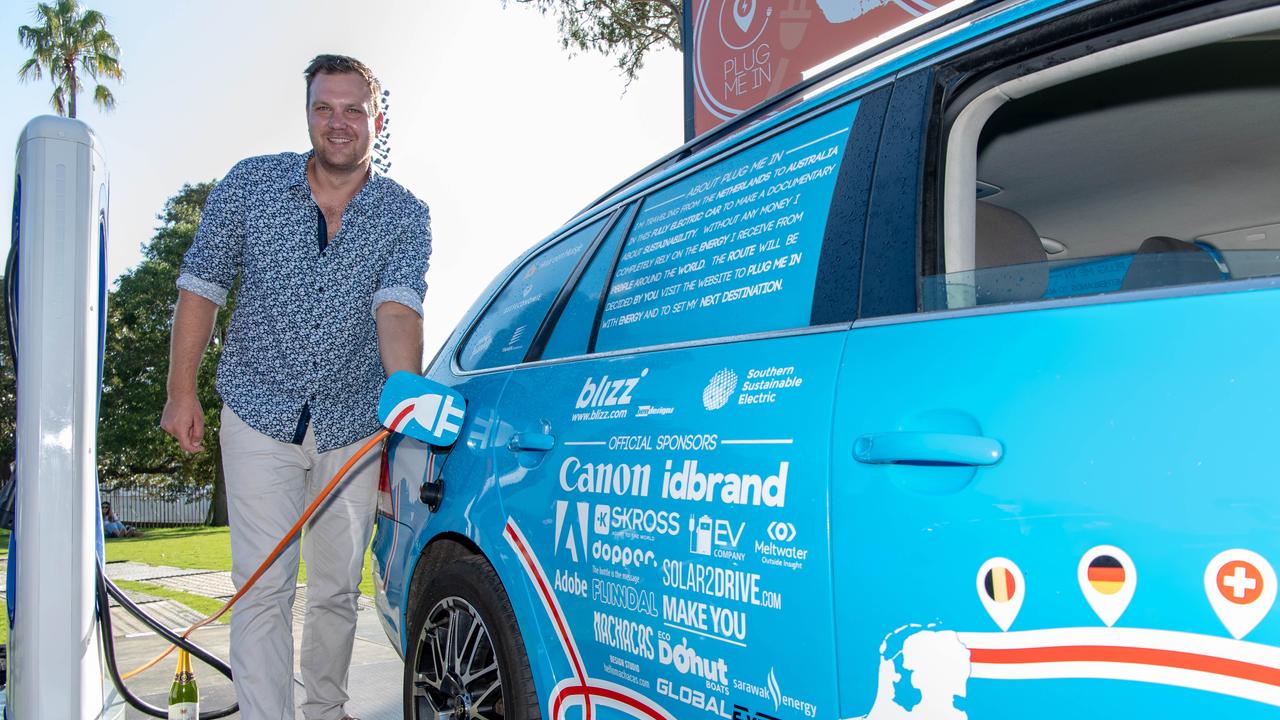 Wiebe Wakker completed the world's longest journey in an electric car, finishing his trip in Sydney on Sunday. Picture: Monique Harmer