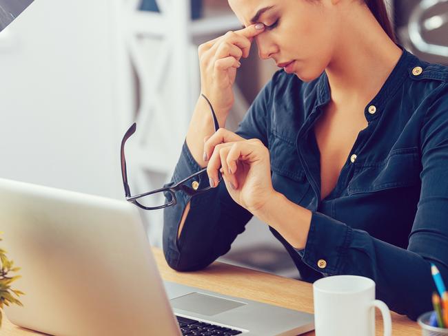 Stock image of stressed woman for wellbeing column in Gold Coast Eye