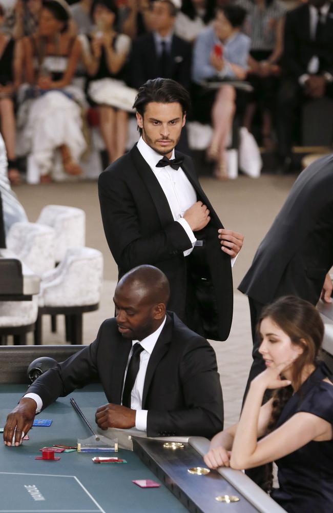 French model Baptiste Giabiconi stands during the Chanel 2015-2016 fall/winter Haute Couture collection fashion show. Picture: AFP