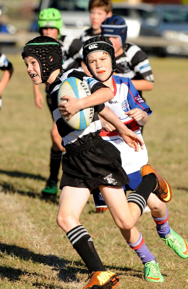 Souths product Darcy Rowan runs the ball in 2014 against the Wynnum Bugs. He has come a long way. Picture: Richard Walker