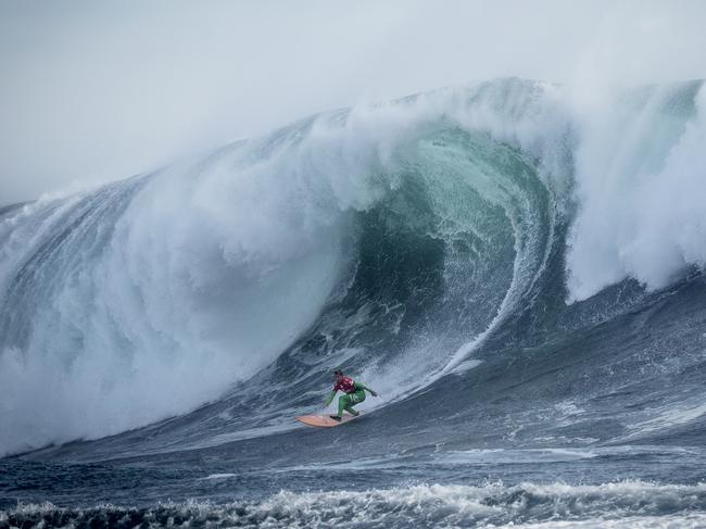 Nick Lamb of Santa Cruz, California USA (pictured) rides an enormous wave winning his Round 1 heat at the Quiksilver Invitational in Punta de Lobos, Pichilemu, Chile on Thursday April 30, 2015. Waves in excess of 25ft (eight meters) poured into the treacherous Punta de Lobos break around midday, allowing organisers just a short window in which to complete Round 1. The event will continue tomorrow May 1 with the Semifinals and the Final scheduled to be completed. Quiksilver Ceremonial is the opening event of the 2015 World Surf League Big Wave World Tour Season. The 24-man field is comprised of the BWT Top 10 as well as six WSL wildcards, six event wildcards and two qualifiers from the 2014/2015 season. The 2015/2016 BWT includes potential contests in Chile, Peru, Mainland Mexico, Baja California, Hawaii, the Basque Country and the Pacific Northwest and features big wave icons such as Grant Baker (ZAF), Greg Long (USA) and Rothman, among others, as they battle one another in the biggest surf on the planet.