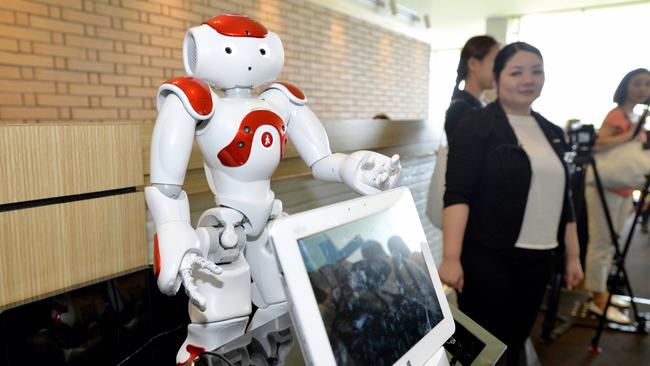 A robotic concierge handles guests questions at the Henn na Hotel in Huis Ten Bosch, a Netherlands-themed amusement park on July 15 in Sasebo, Nagasaki.