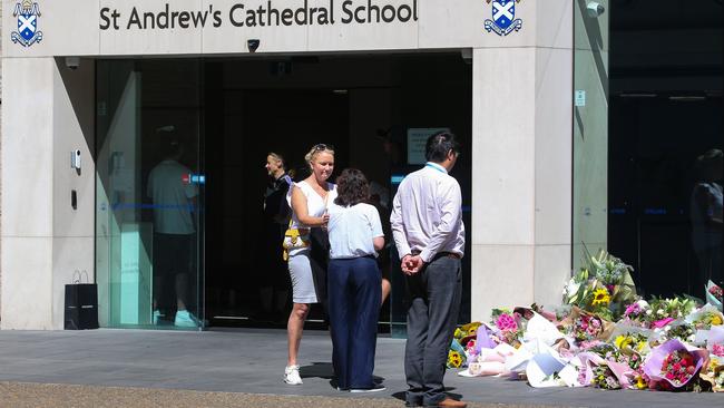 Flowers left in honour of Ms James outside the St Andrew’s School. Picture: NCA Newswire /Gaye Gerard