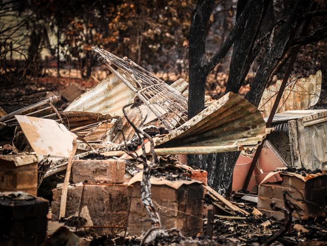 A home recently destroyed by bushfires can be seen near the town of Bilpin on December 29. Picture: Getty