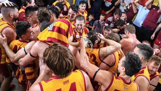 Emotional Nunawading players after their big win. Picture: Davis Harrigan