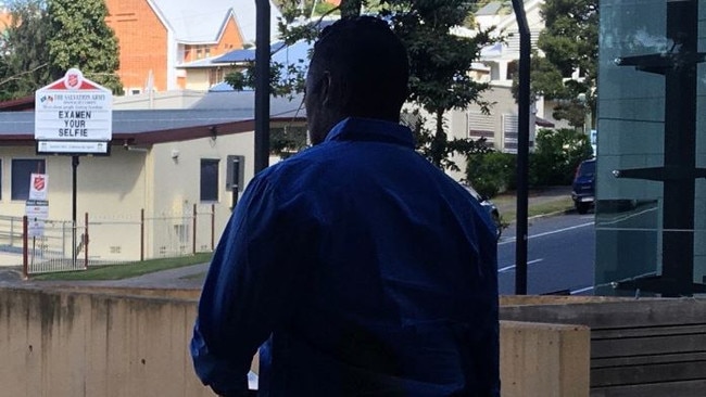 Tim Chapman walks away from court after pleading guilty to rape. He was sentenced to a jail term that allowed him to go free after time already served.