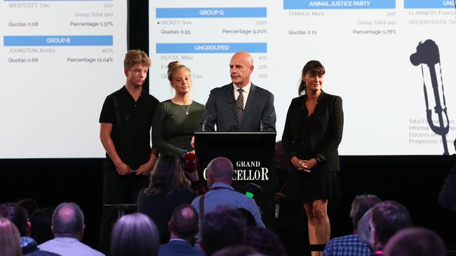 Then-premier Peter Gutwein arrives inside the tally room alongside wife Amanda and children Finn and Millie as he celebrates the Liberal party's win during the Tasmanian state election in 2021. Picture: Zak Simmonds