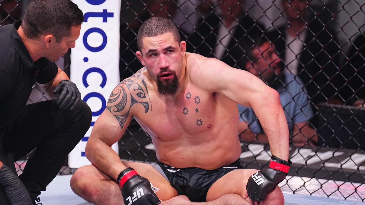 ABU DHABI, UNITED ARAB EMIRATES - OCTOBER 26: Robert Whittaker of New Zealand reacts after a submission loss against Khamzat Chimaev of Russia in a middleweight fight during the UFC 308 event at Etihad Arena on October 26, 2024 in Abu Dhabi, United Arab Emirates. (Photo by Chris Unger/Zuffa LLC)