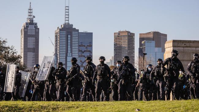 Police on patrol as anti-lockdown protesters protest march in Melbourne in 2021. Picture: Jason Edwards