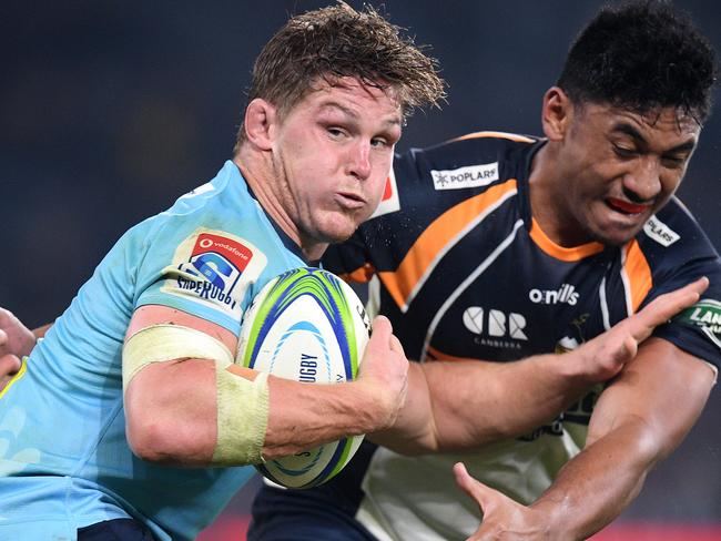 Michael Hooper of the Waratahs fends off a tackle by Irae Simone of the Brumbies during the Round 17 Super Rugby match between the NSW Waratahs and the ACT Brumbies at Bankwest Stadium in Sydney, Saturday, June 8, 2019. (AAP Image/Dan Himbrechts) NO ARCHIVING, EDITORIAL USE ONLY