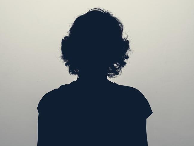 Unknown female person silhouette in studio. Concept of depression, stress or anonymous - picture istock