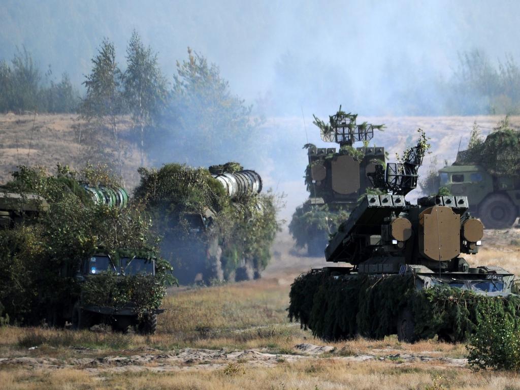 OSA-AKM surface-to-air missile launchers and S-300 anti-aircraft systems move to firing positions during the joint Russian-Belarusian military exercises Zapad-2017 (West-2017). Russia announced new security measures to protect its military in Syria, including supplying the Syrian army with an S-300 air defence system and jamming radars. Picture: AFP