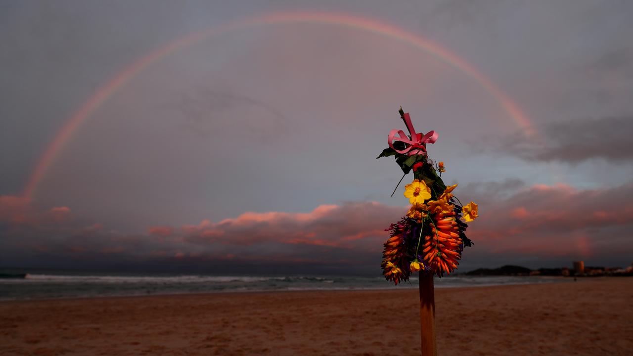 A rainbow is seen at Palm Beach on Wednesday after the death of Alex Pullin, aged 32. Picture: Chris Hyde/Getty Images