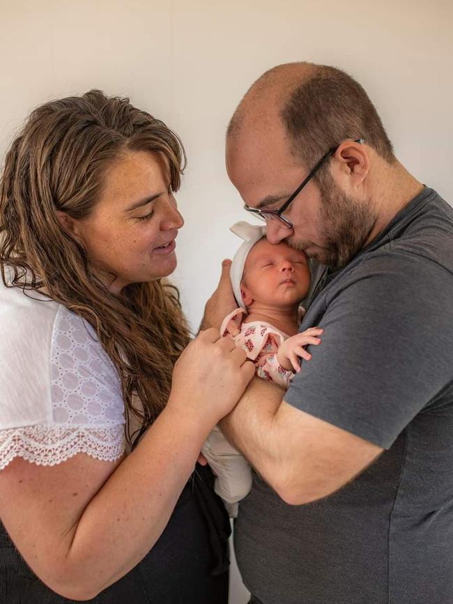 Baby Anniselle Othams-Schmiauke with her parents Sage and Marc. Picture: Supplied