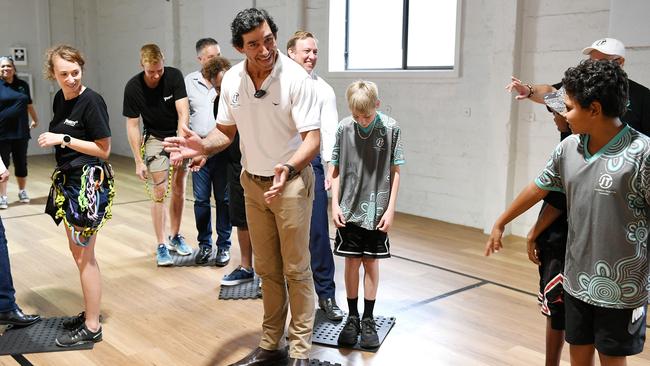 Johnathan Thurston and the Queensland Premier Steven Miles join in a team building game with JTYouGotThis program graduates. Picture: Shae Beplate.