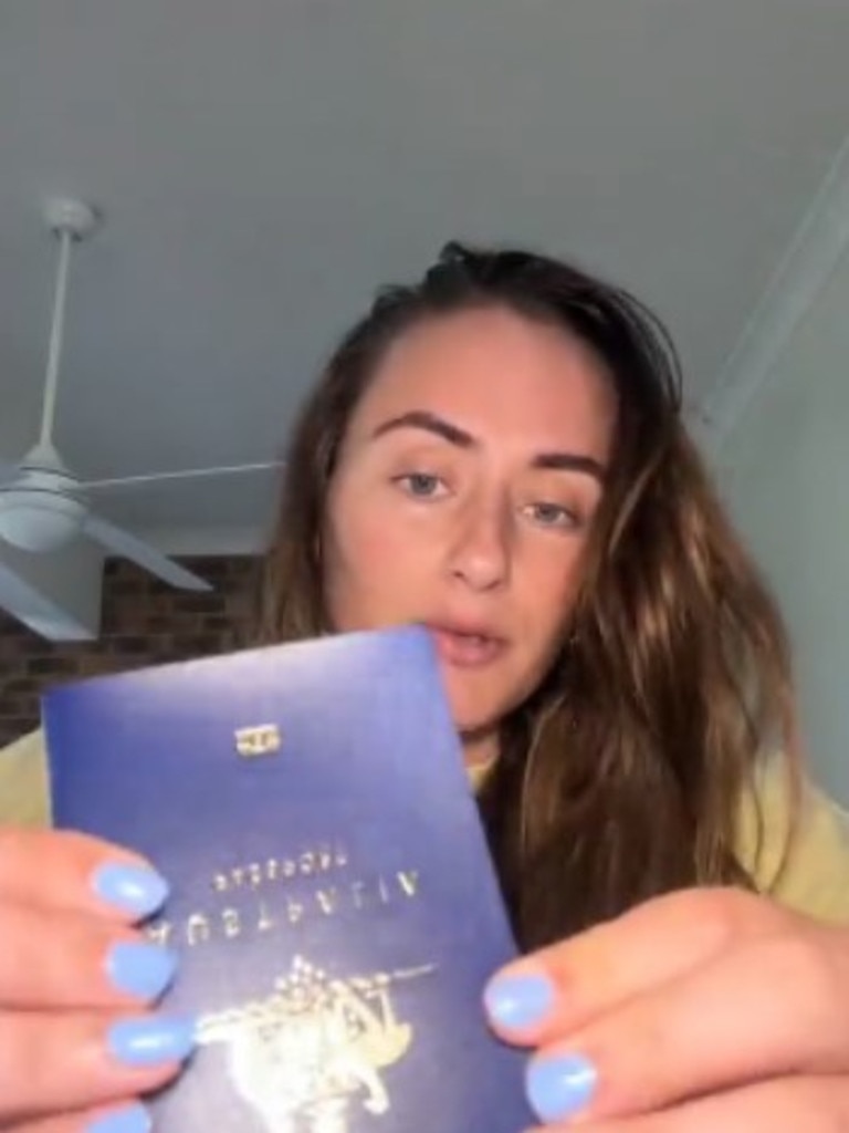 “What happened?” She asked of the new passport. Picture: TikTok/The_Greataway