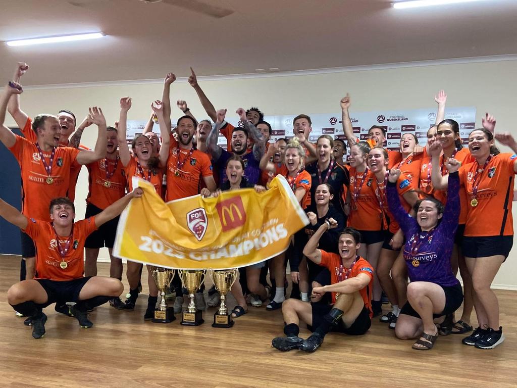 Whitsunday United men and women celebrate together having secured the double. Picture: Supplied.