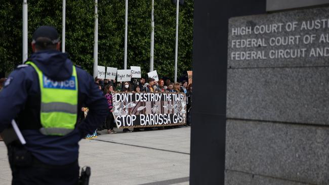 Protesters gather at the front of the Federal Court in 2022, rallying against gas developments in the Barossa field north of Darwin. (Photo by Tamati Smith/Getty Images)