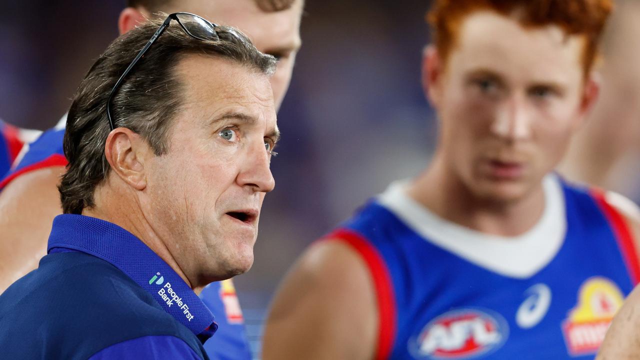 MELBOURNE, AUSTRALIA - MAY 05: Luke Beveridge, Senior Coach of the Bulldogs addresses his players at three quarter time during the 2024 AFL Round 08 match between the Western Bulldogs and the Hawthorn Hawks at Marvel Stadium on May 05, 2024 in Melbourne, Australia. (Photo by Dylan Burns/AFL Photos via Getty Images)