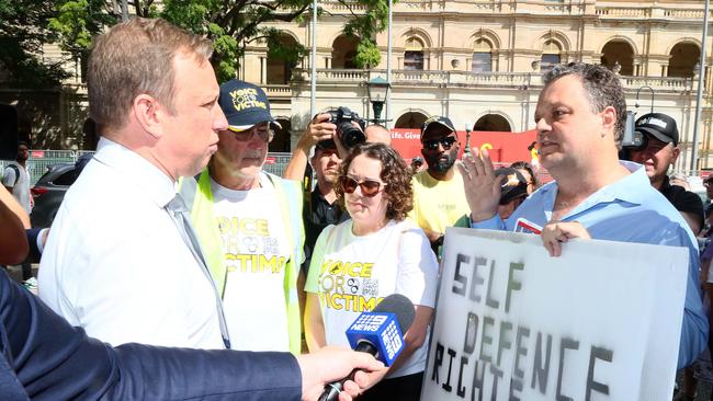 Premier Steven Miles is confronted by victims of crime. Picture: Tertius Pickard