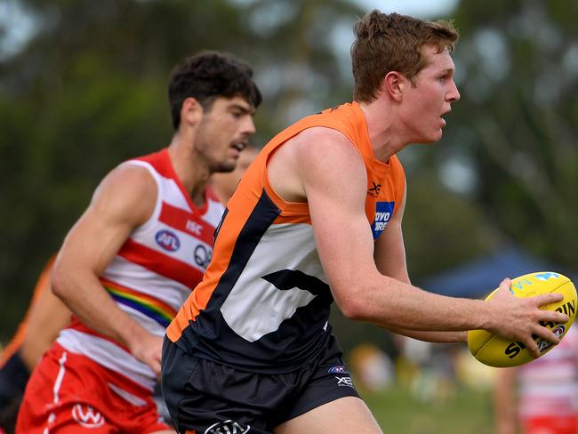 Tom Green of the Giants controls the ball during the AFL Marsh Community Series pre-season match between the GWS Giants and the Sydney Swans at Blacktown International Sportspark in Sydney, Saturday, February 29, 2020. (AAP Image/Dan Himbrechts) NO ARCHIVING, EDITORIAL USE ONLY