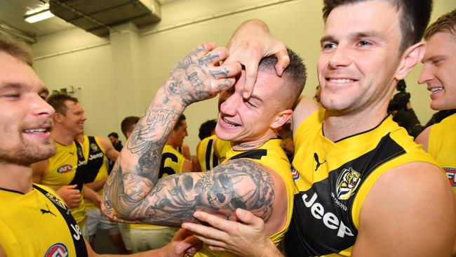 Dustin Martin gets some love from his captain after being the best player on the ground in Richmond’s win. Picture: AAP